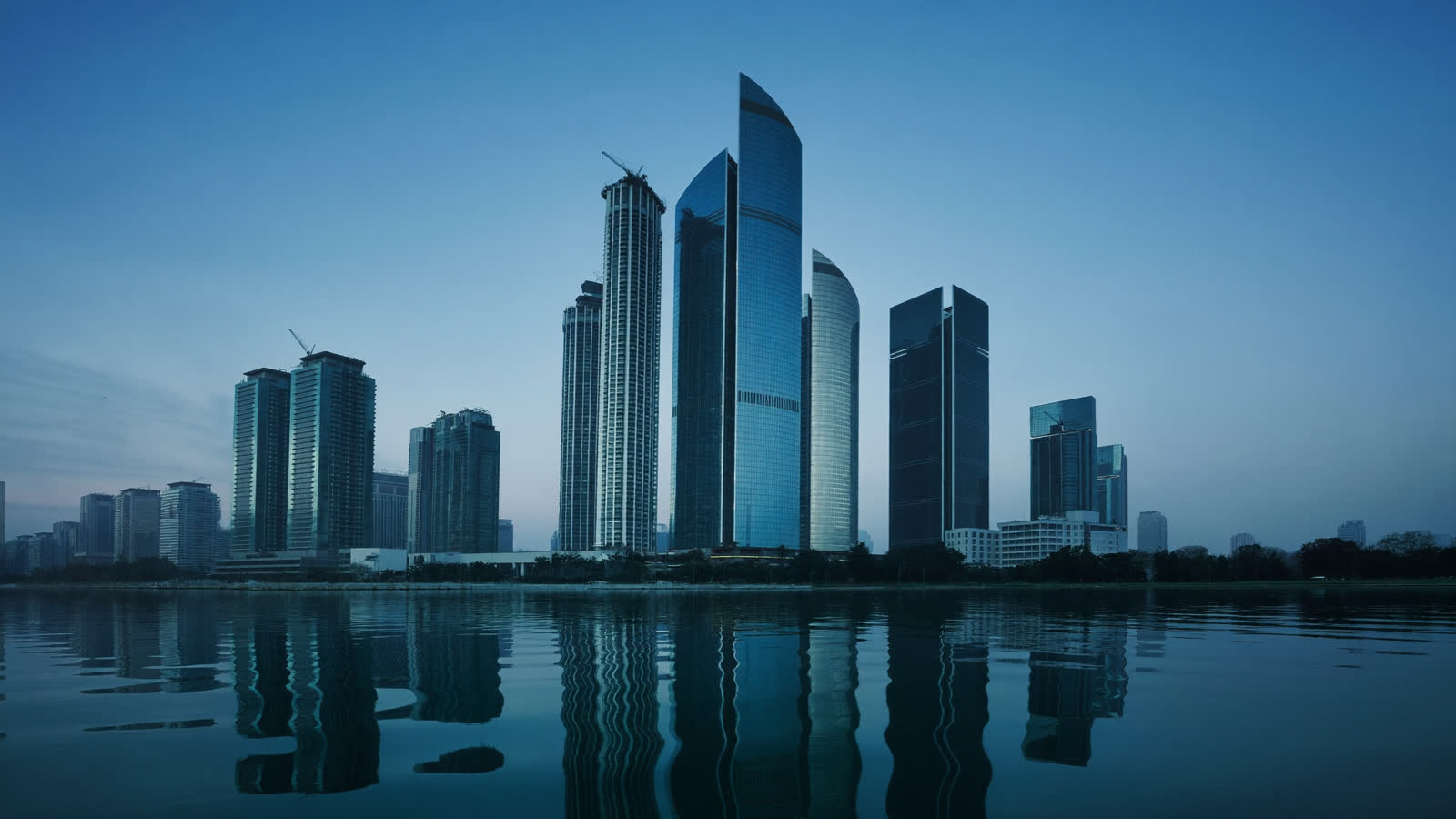 Crescent-shaped Katara Towers at blue hour, Lusail, Qatar